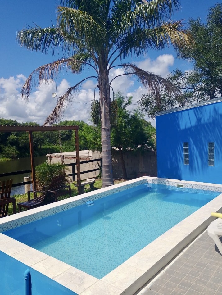 Casa sobre el rio en Helvecia 